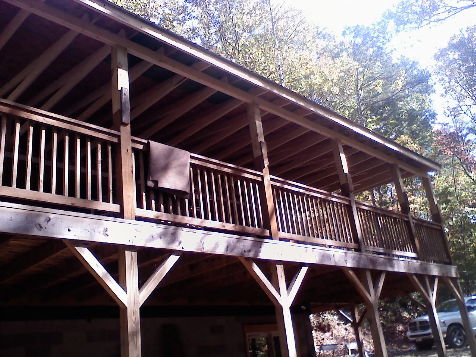 Timber framing under a new elevated porch and deck — Roof Leak Repair in Bighorn by Roofing Brothers
